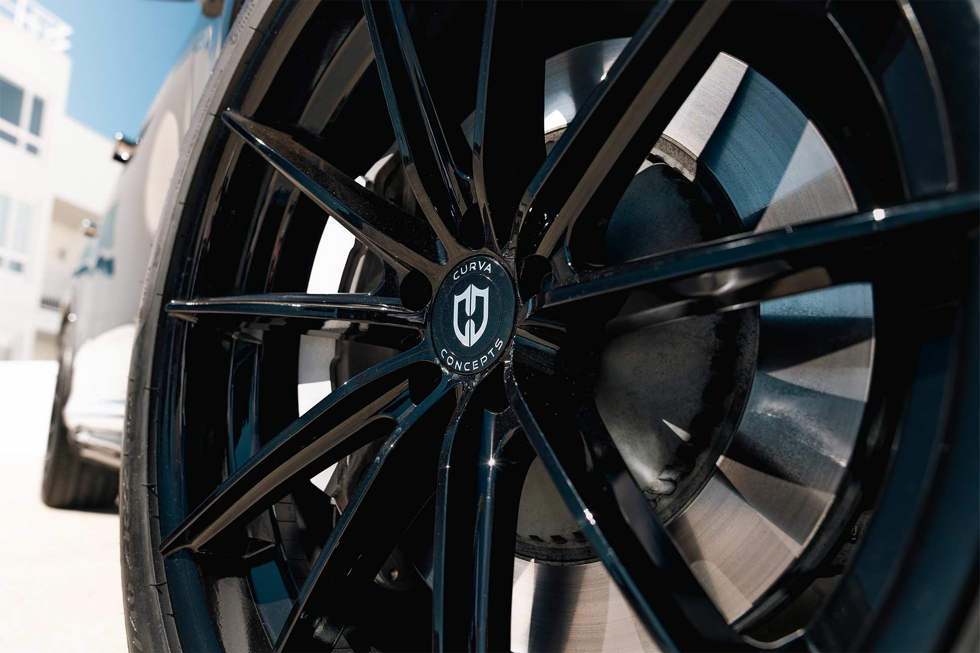 A black Mercedes-Benz EQS 580 on Curva Concepts CFF46 aftermarket wheels