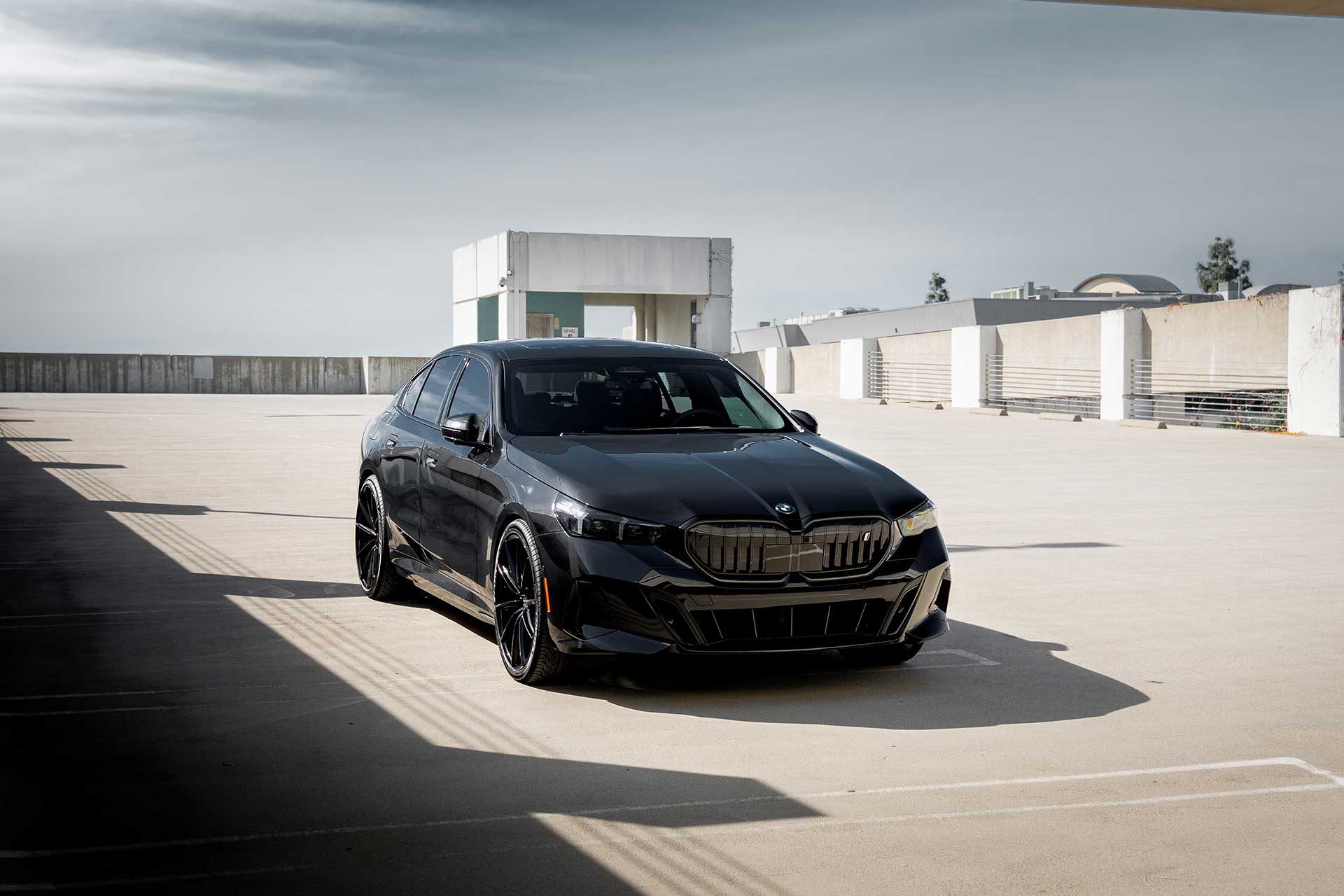 black bmw i5 with gloss black curva concepts cff46 flow forged wheels