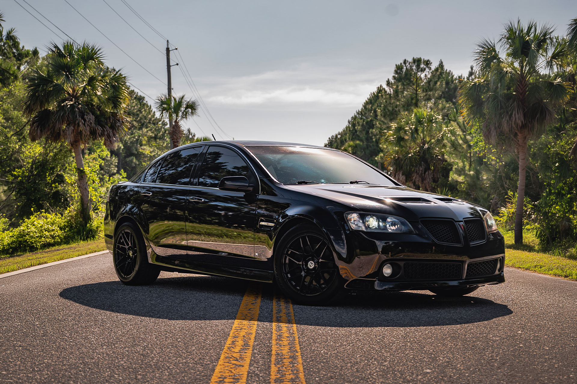 black pontiac g8 gt with gloss black flow forged cff300 performance wheels