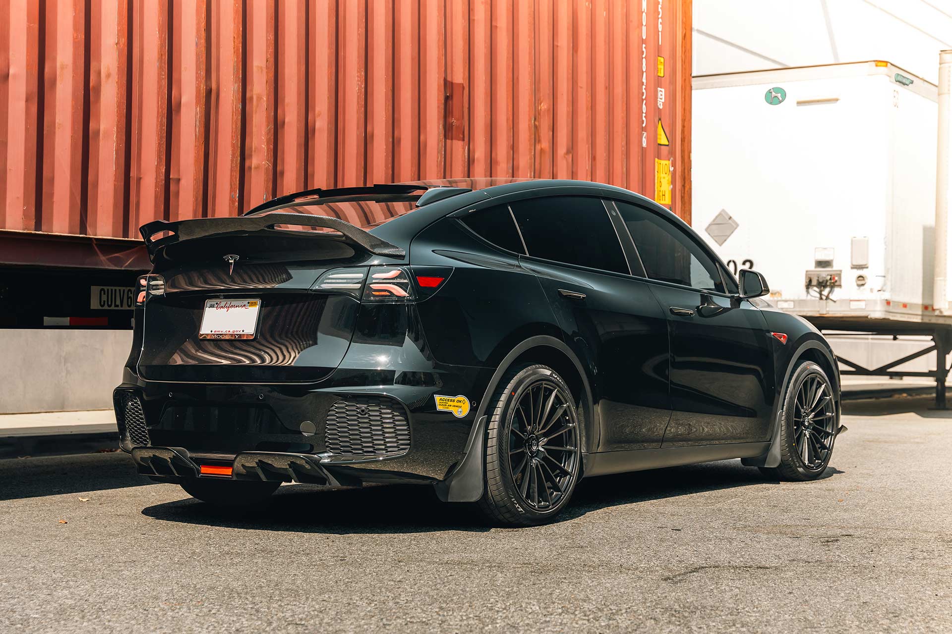 black tesla model y with black machined satin tint cff75 flow forged wheels