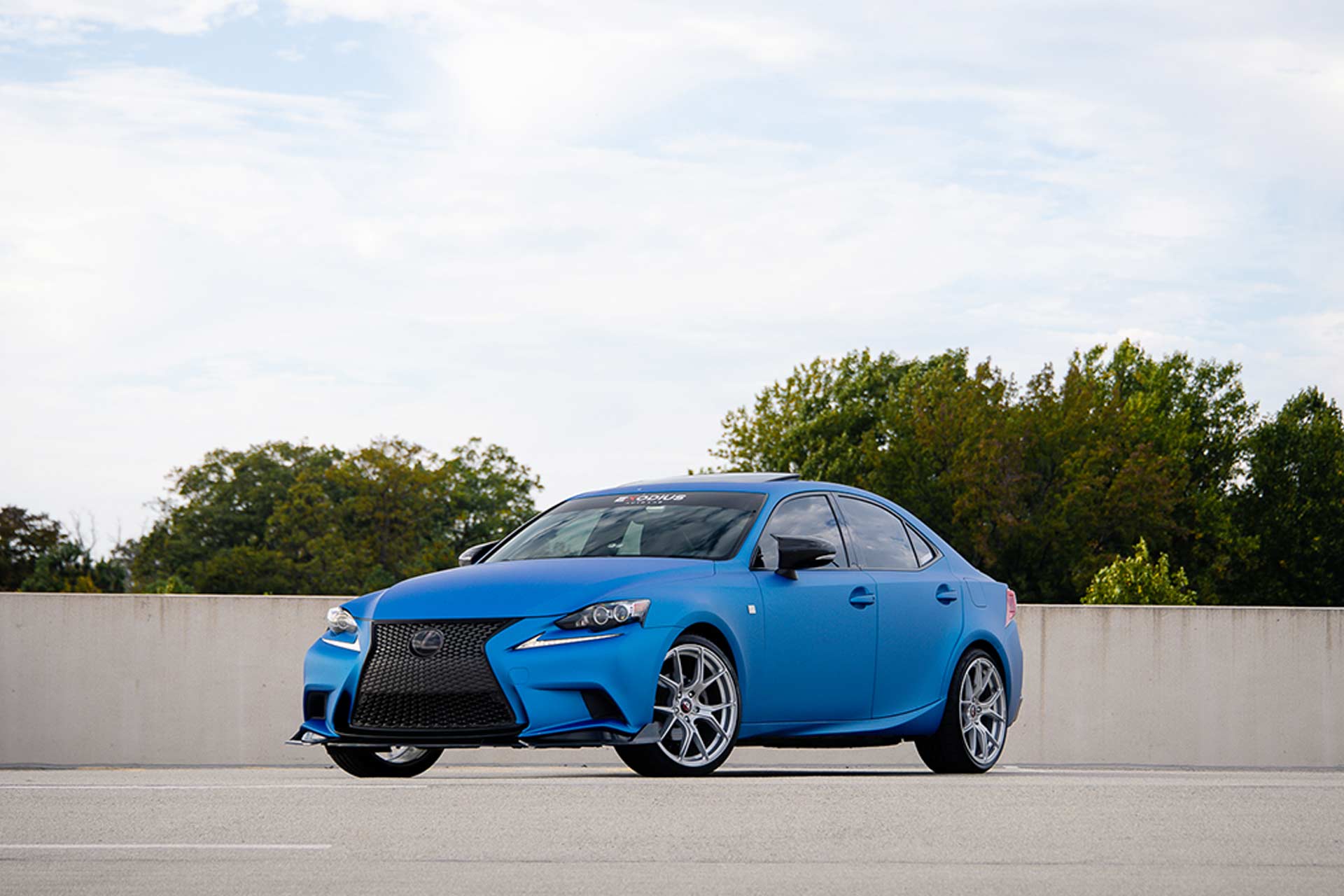 blue wrapped lexus is 250 f sport with silver c42 curva concepts wheels