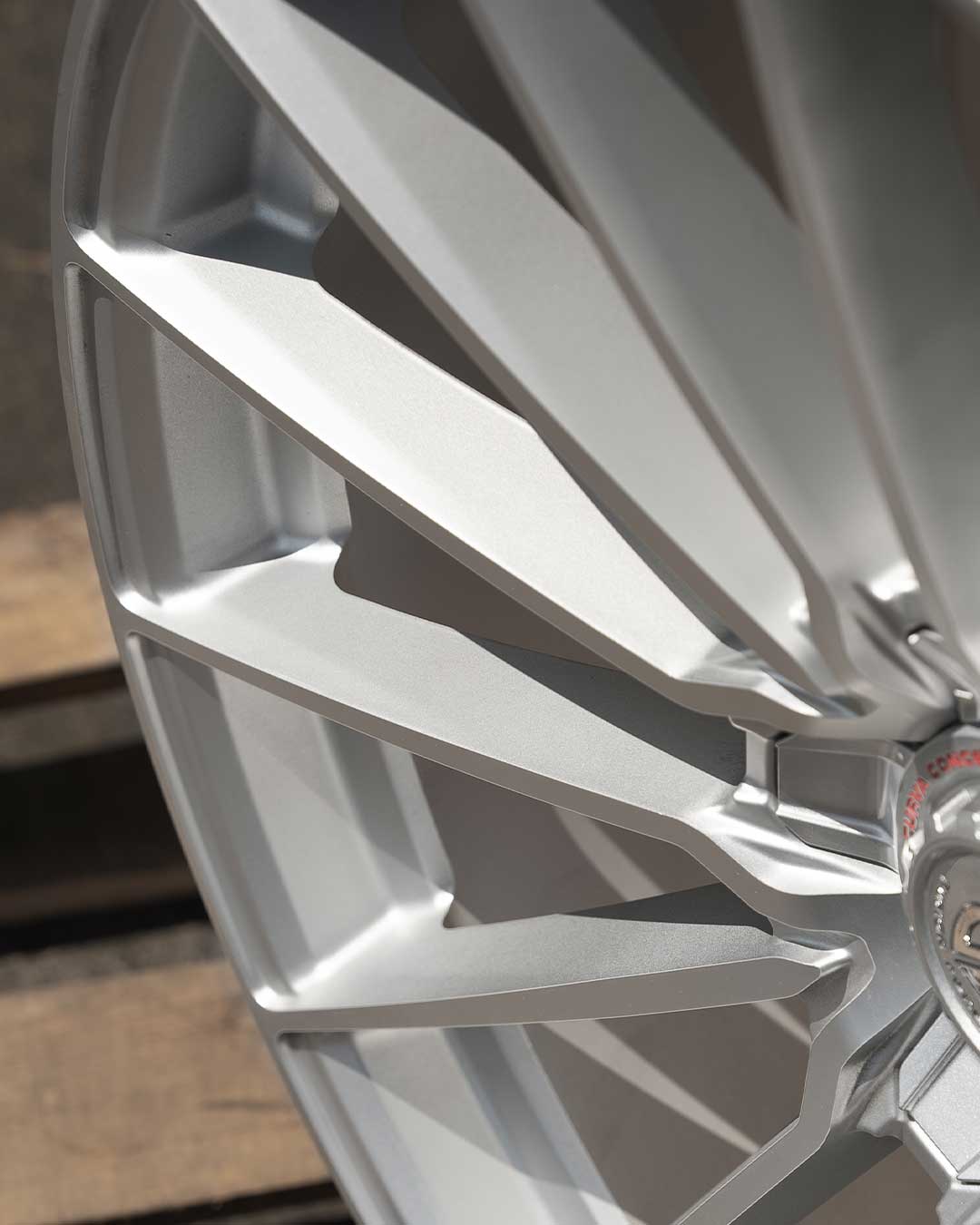 detail macro shot of silver flow forged cff75 wheel spokes