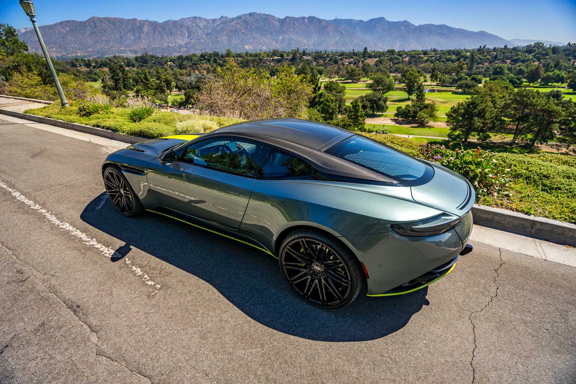 green aston martin db11 amr with gloss black curva concepts c48 wheels