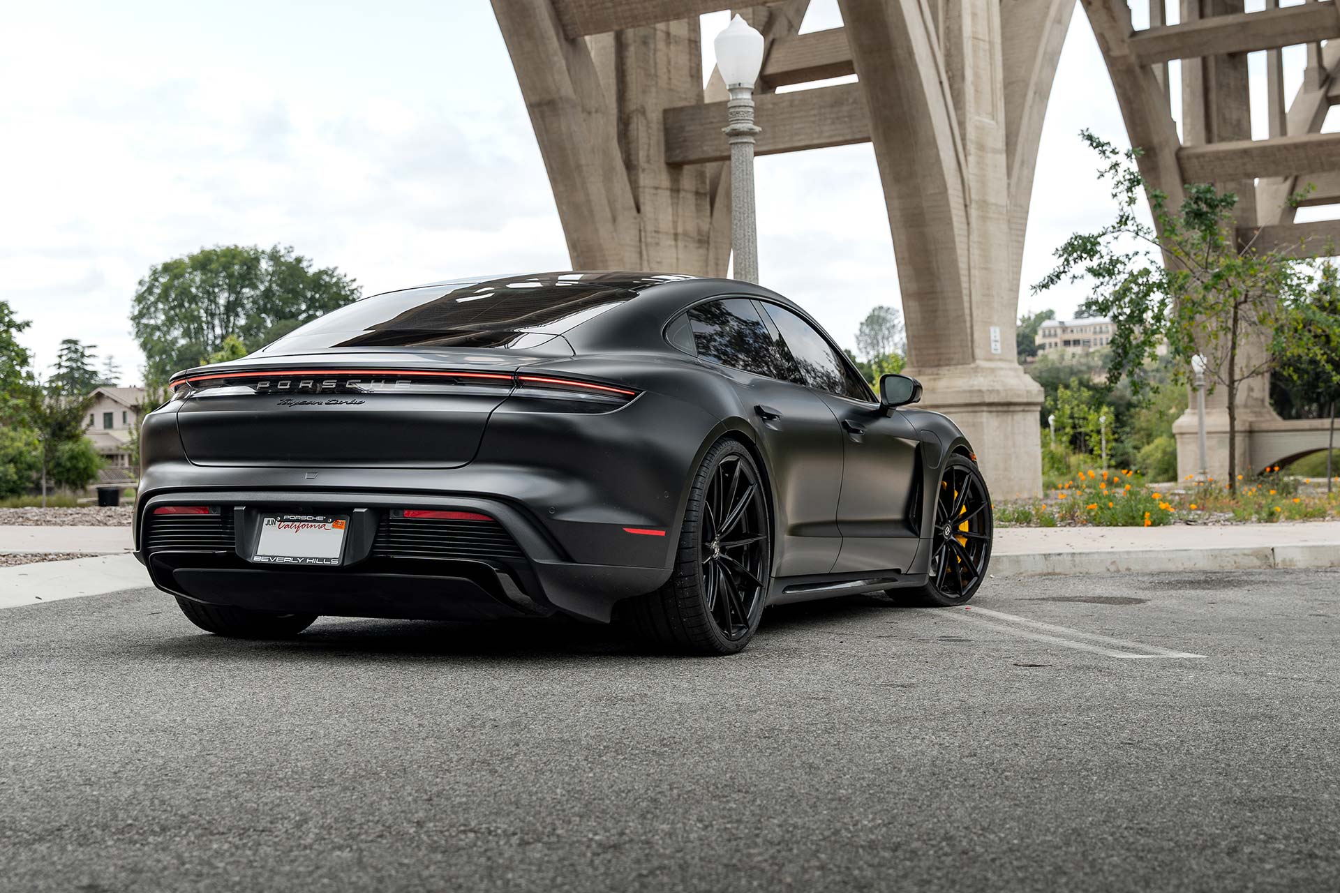 matte black porsche taycan turbo with gloss black cff46 flow forged wheels