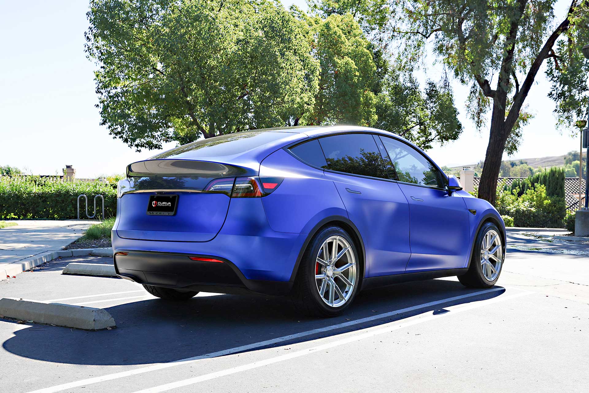 matte blue tesla model y with brushed clear coat cff70 flow forged wheels