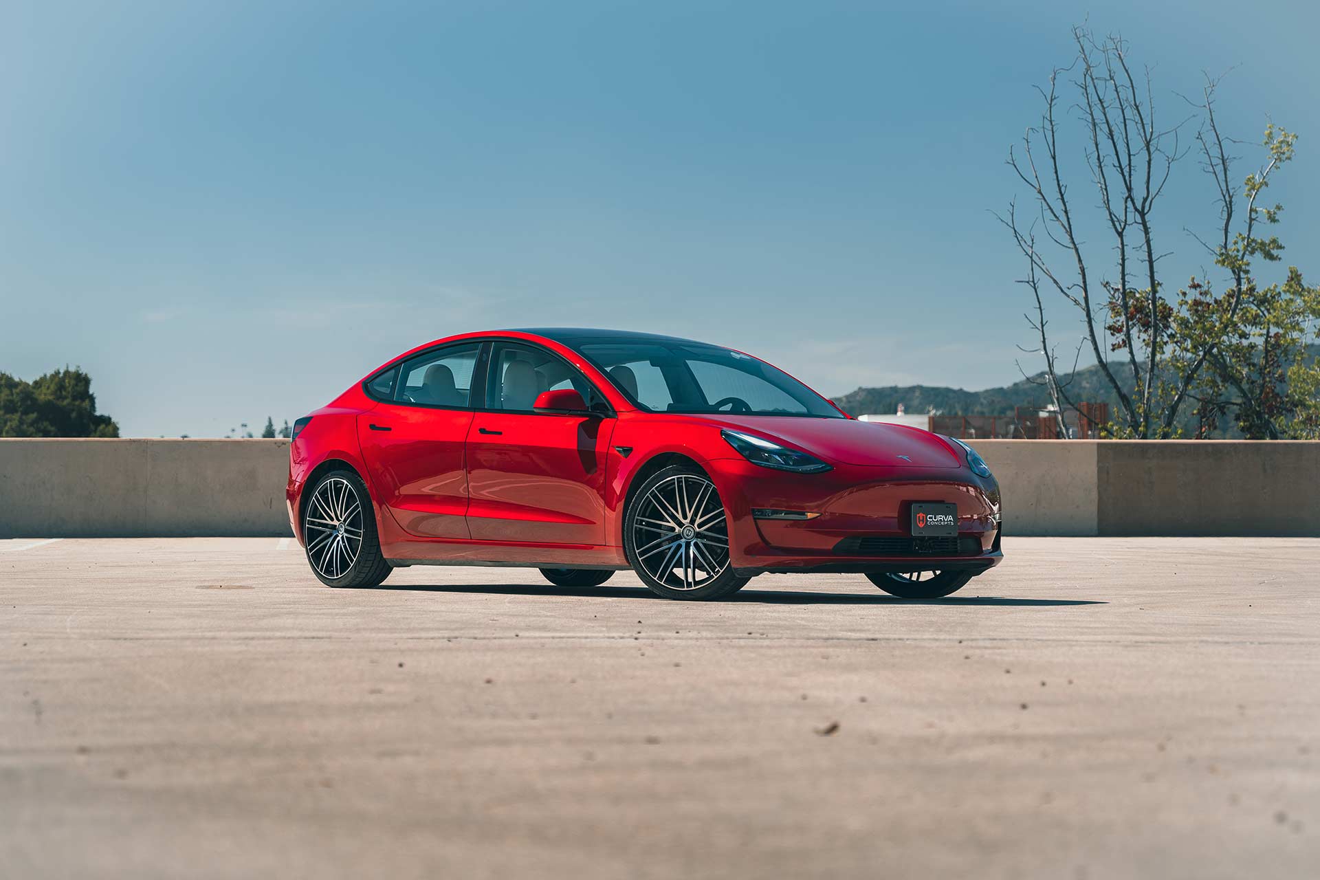red tesla model 3 with gloss black machined cff50 flow forged wheels