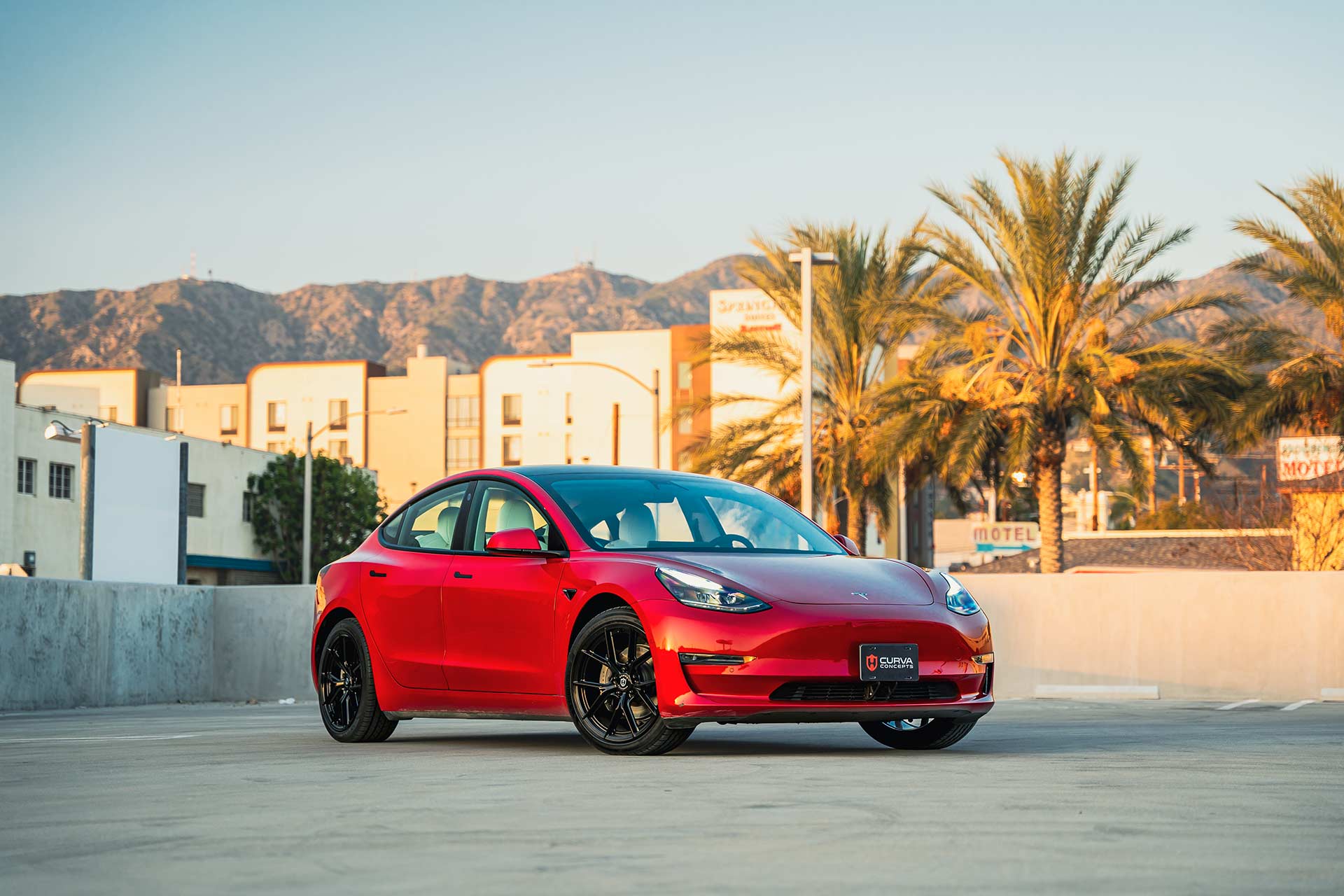 red tesla model 3 with gloss black cff70 flow forged wheels