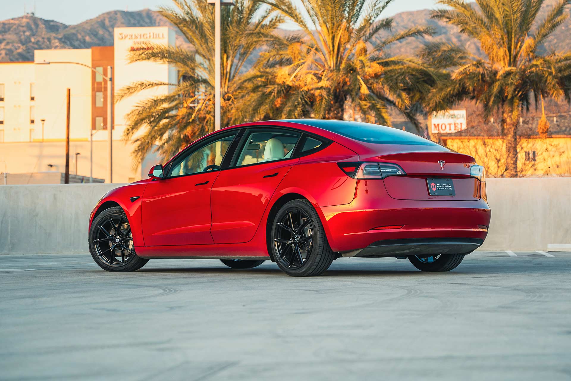 red tesla model 3 with gloss black cff70 flow forged wheels