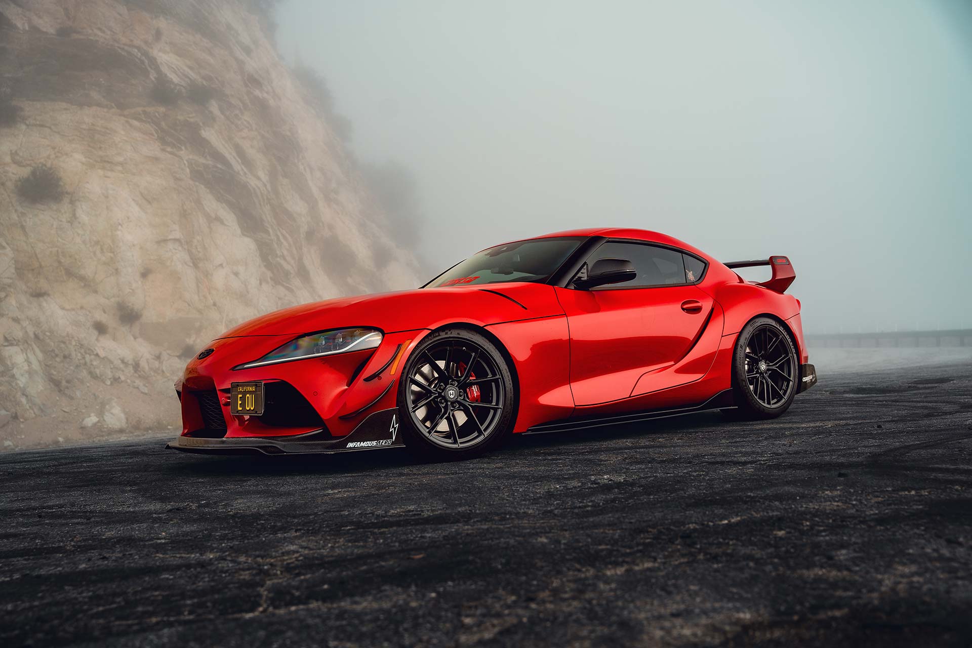 red toyota gr supra with gloss black cff70 flow forged wheels