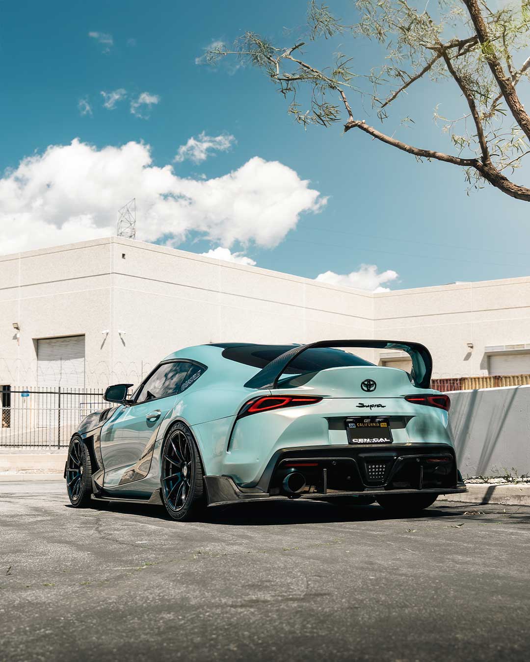 urban bamboo wrapped toyota gr supra mkv with gloss black flow forged cff72 wheels showcasing wheel offset and fitment